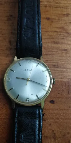 Doxa Ceas mecanic elvețian Vintage, cadran argintiu, carcasă aurie aur stare bun