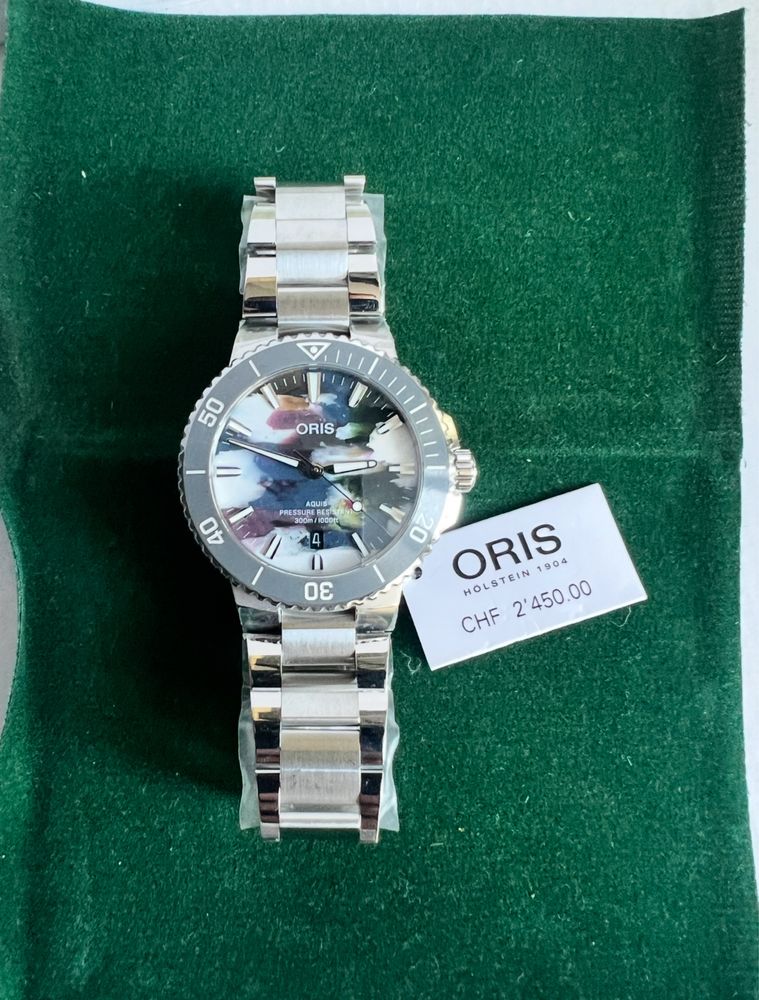 Oris Aquis Date Upcycle otel stare nou