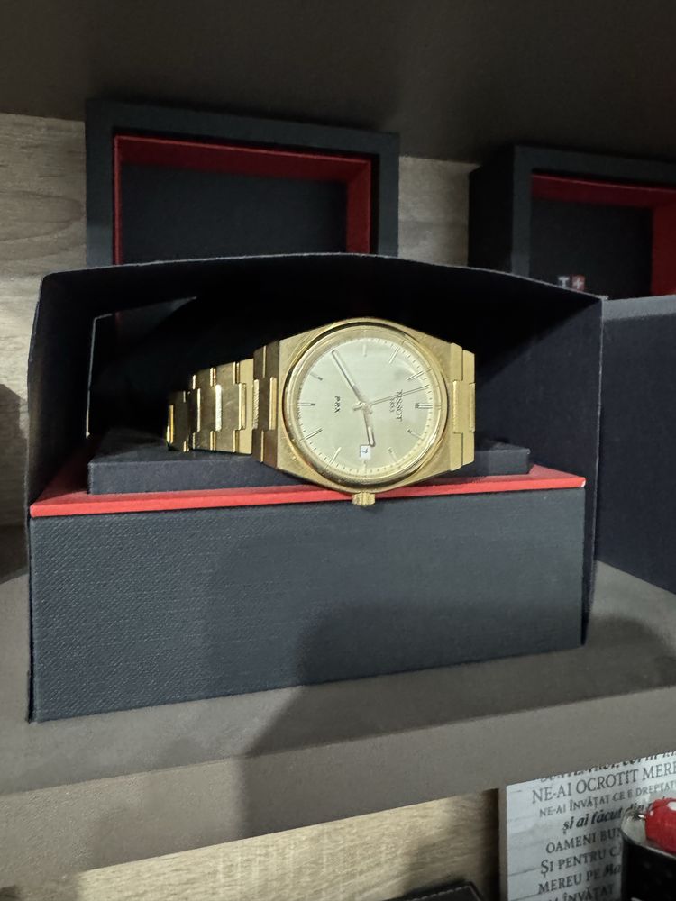Tissot PRX aur stare bun